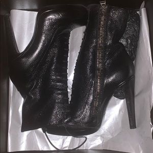 $975 ROCCO P. black pebble leather mid calf heel